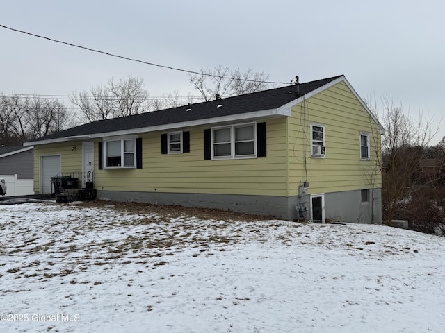 view of snow covered property