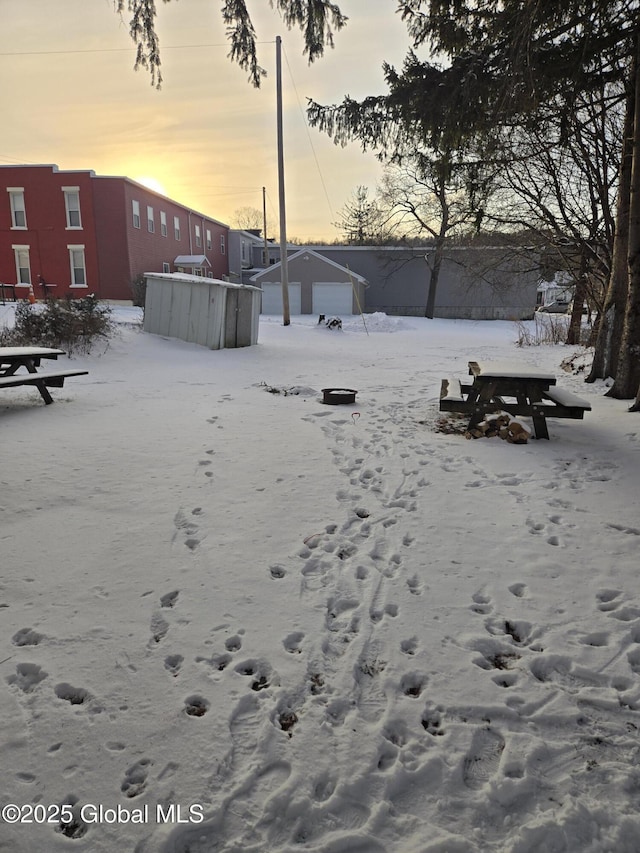 view of yard covered in snow