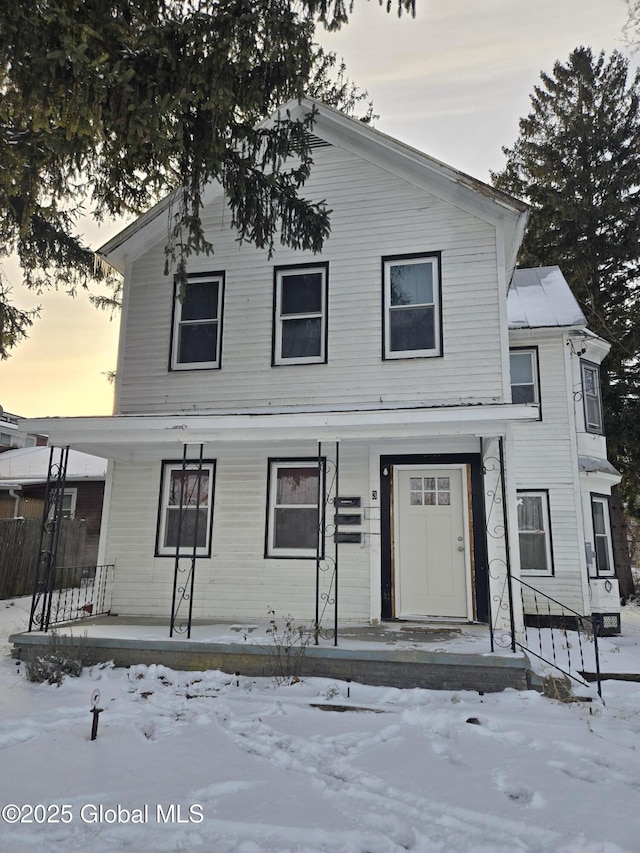 view of front of property featuring covered porch