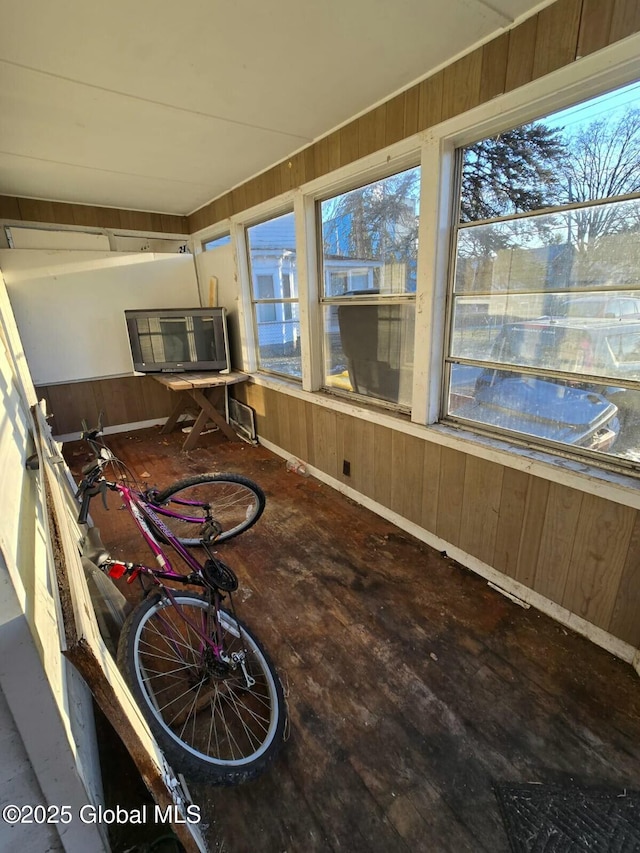 sunroom featuring a healthy amount of sunlight