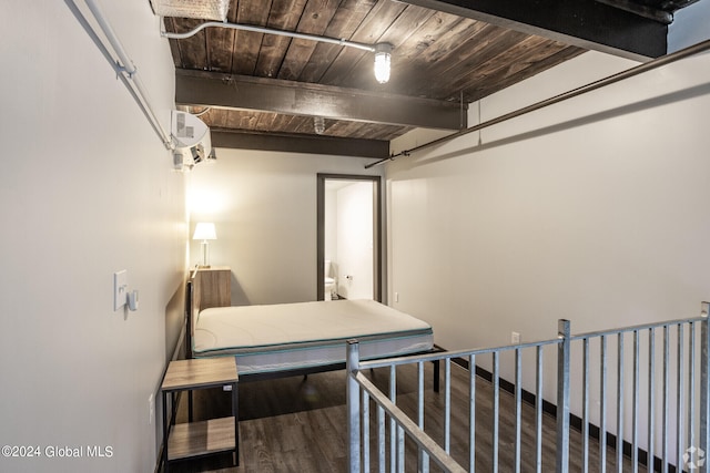 corridor featuring hardwood / wood-style flooring, wooden ceiling, and beamed ceiling