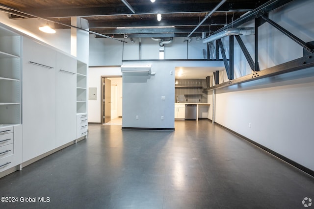 garage featuring an AC wall unit