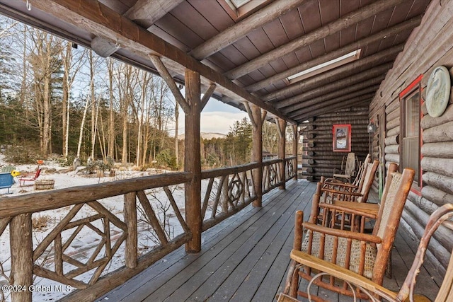 view of snow covered deck