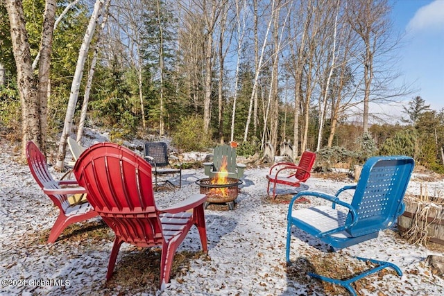 view of patio / terrace featuring a fire pit