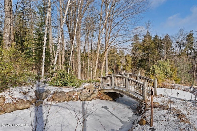 surrounding community with a wooden deck