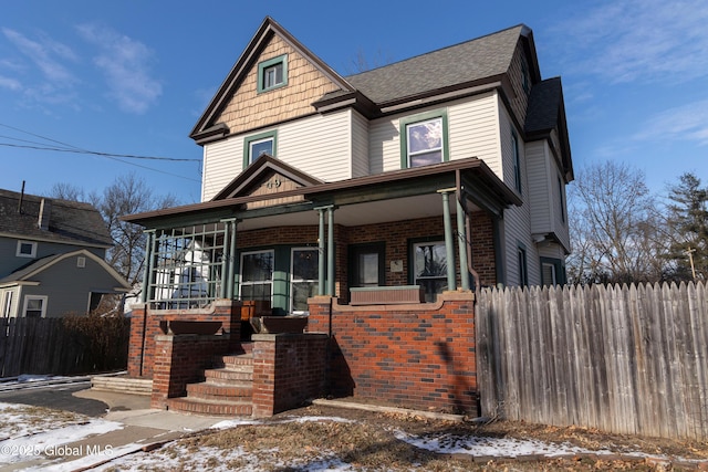 view of front of property featuring covered porch