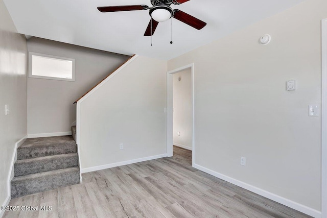 interior space with ceiling fan and light wood-type flooring