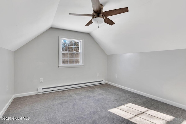 bonus room featuring vaulted ceiling, light colored carpet, ceiling fan, and baseboard heating