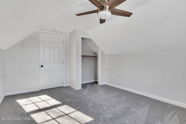 bonus room featuring lofted ceiling, ceiling fan, and carpet flooring