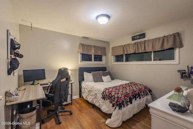 bedroom featuring hardwood / wood-style floors