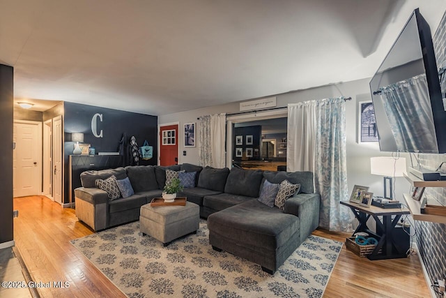 living room with light hardwood / wood-style floors