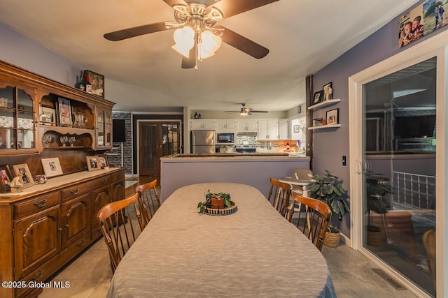 dining room with light tile patterned flooring