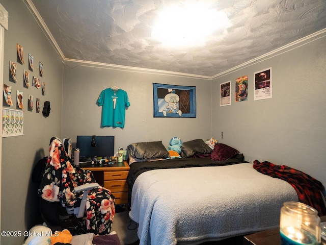 bedroom with ornamental molding