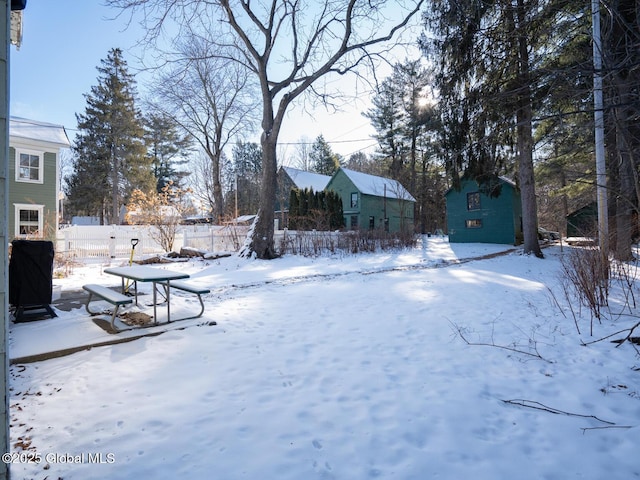 view of yard covered in snow