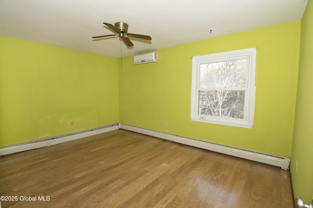 empty room featuring a baseboard radiator, a wall mounted AC, ceiling fan, and light hardwood / wood-style flooring