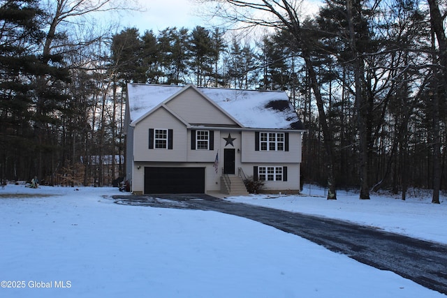 raised ranch with a garage