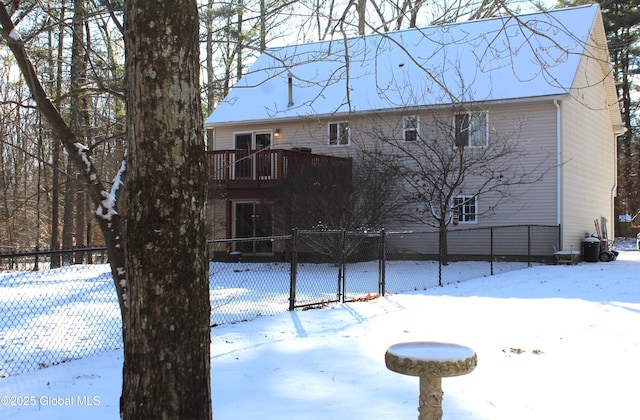 view of snow covered house