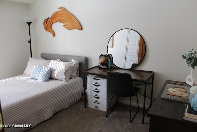 bedroom featuring dark colored carpet