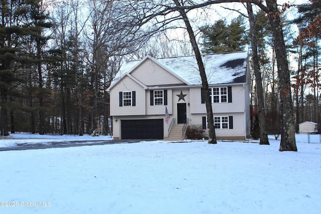 raised ranch featuring a garage