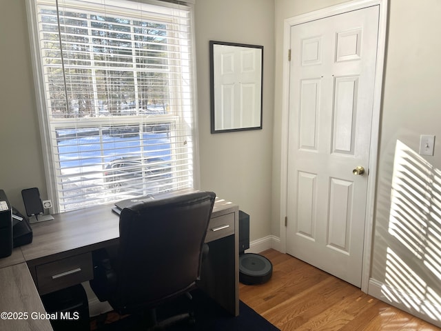 home office featuring light hardwood / wood-style flooring