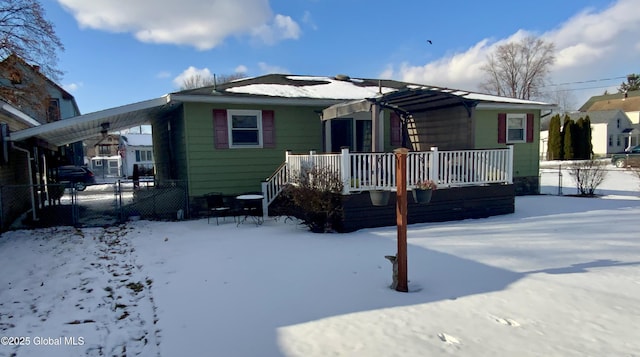 view of front of house featuring a carport