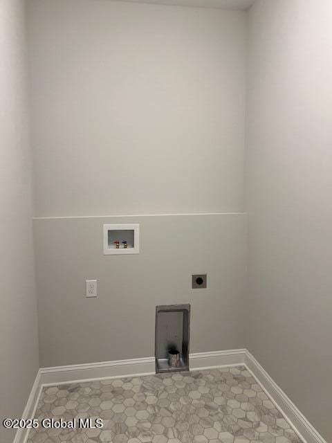 clothes washing area featuring washer hookup and hookup for an electric dryer