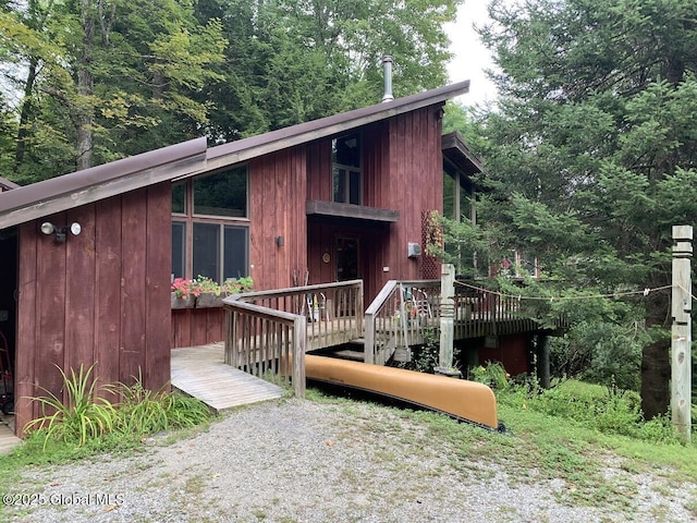 view of front facade featuring a wooden deck