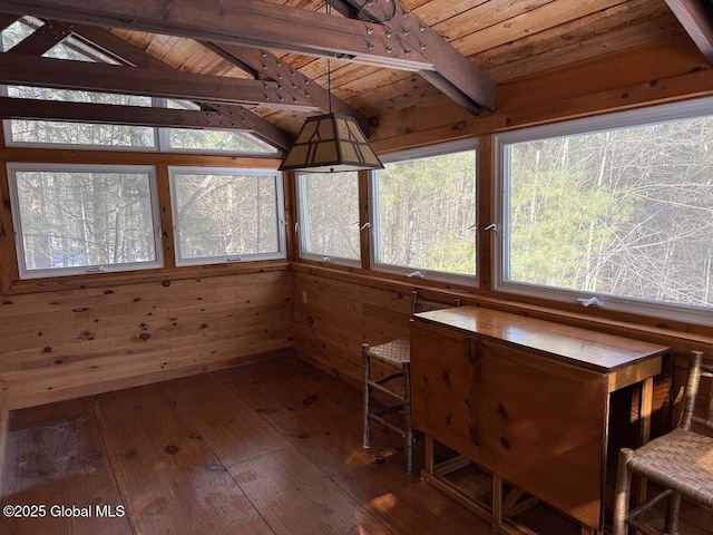 unfurnished sunroom with vaulted ceiling with beams and wooden ceiling