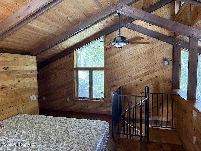 bedroom with wood ceiling, wood-type flooring, wood walls, and lofted ceiling with beams