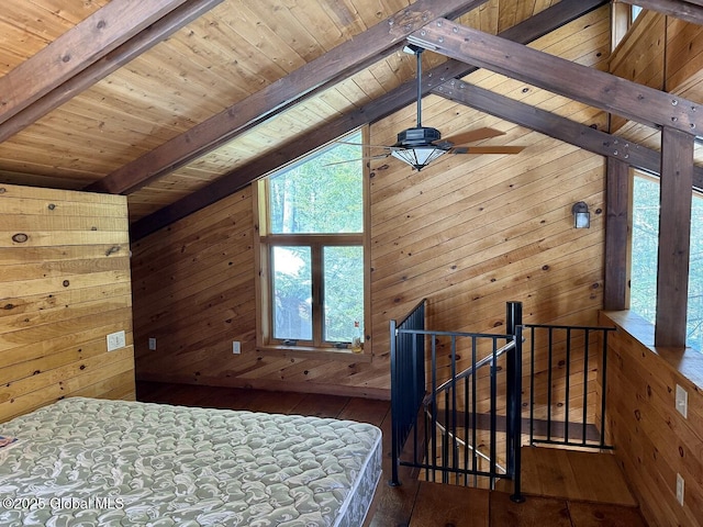 bedroom featuring vaulted ceiling with beams, hardwood / wood-style floors, wooden ceiling, and wooden walls