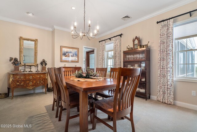 dining area featuring light colored carpet and plenty of natural light