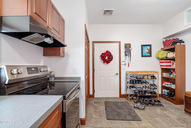 kitchen featuring stainless steel range with electric stovetop