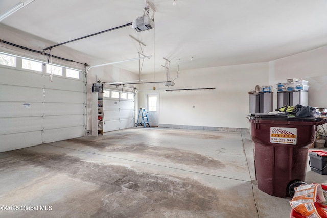 garage featuring a garage door opener