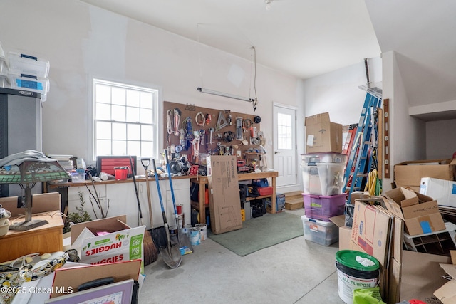 misc room featuring a healthy amount of sunlight and a workshop area