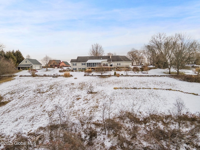 view of yard covered in snow