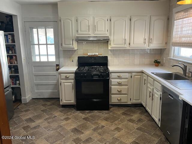 kitchen featuring sink, white cabinets, and stainless steel appliances