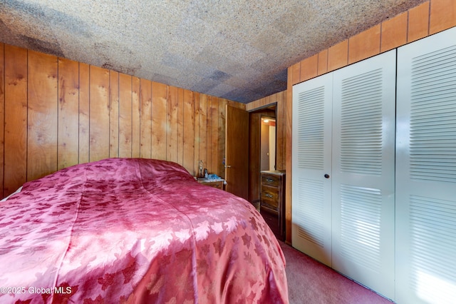 carpeted bedroom with wooden walls