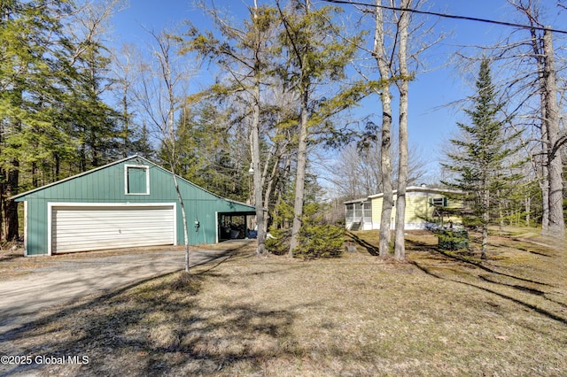 758 S Shore Rd E, Caroga Lake, Caroga, NY 12032 - exterior space featuring driveway, an outdoor structure, and a detached garage