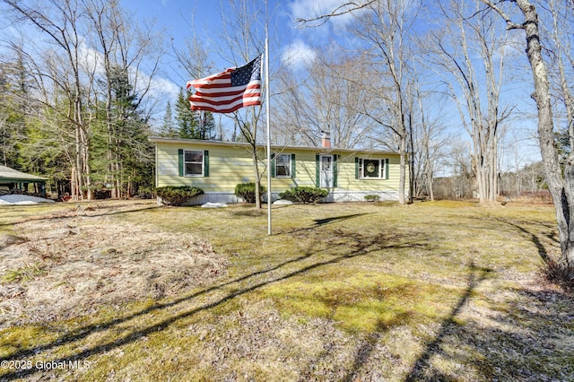 758 S Shore Rd E, Caroga Lake, Caroga, NY 12032 - view of front of home with a chimney and a front yard
