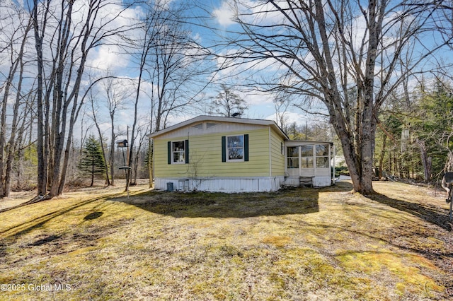 758 S Shore Rd E, Caroga Lake, Caroga, NY 12032 - view of front of property with a sunroom