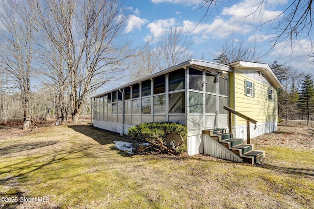 758 S Shore Rd E, Caroga Lake, Caroga, NY 12032 - manufactured / mobile home featuring a sunroom