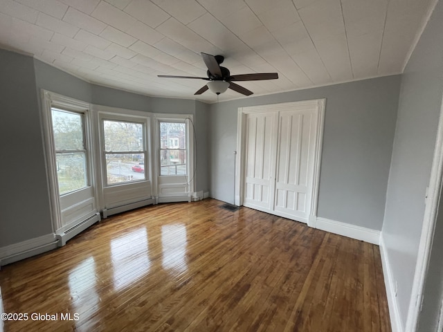 unfurnished bedroom with light wood-type flooring and ceiling fan