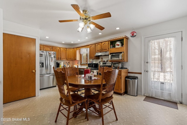 dining room with ceiling fan