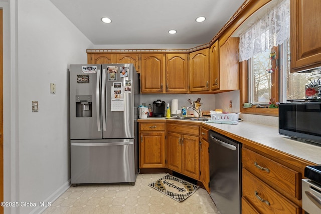 kitchen with appliances with stainless steel finishes and sink