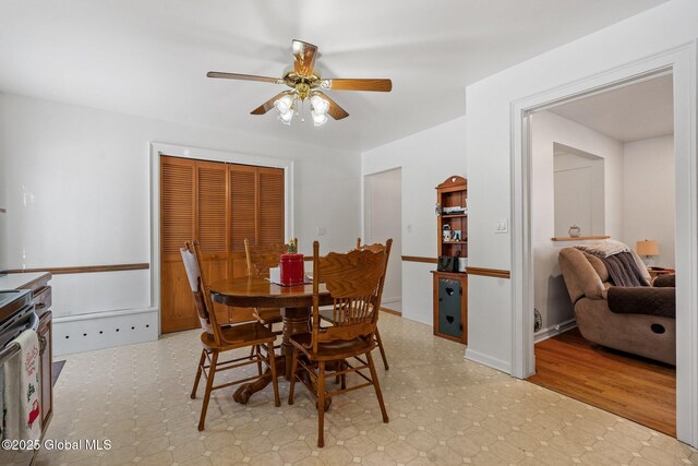 dining room featuring ceiling fan