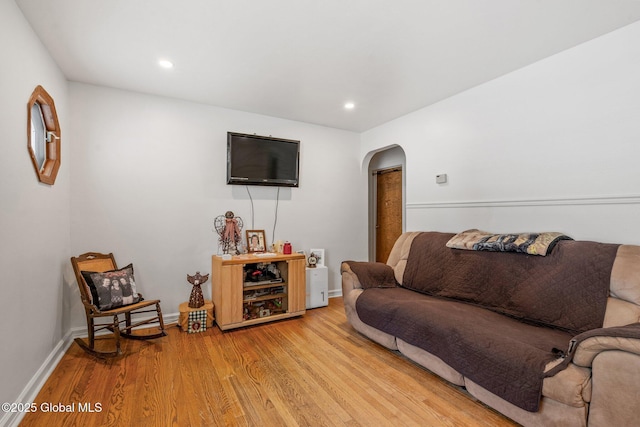 living room with light hardwood / wood-style floors