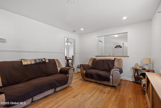 living room with light hardwood / wood-style flooring