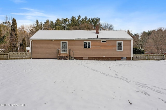 view of snow covered property