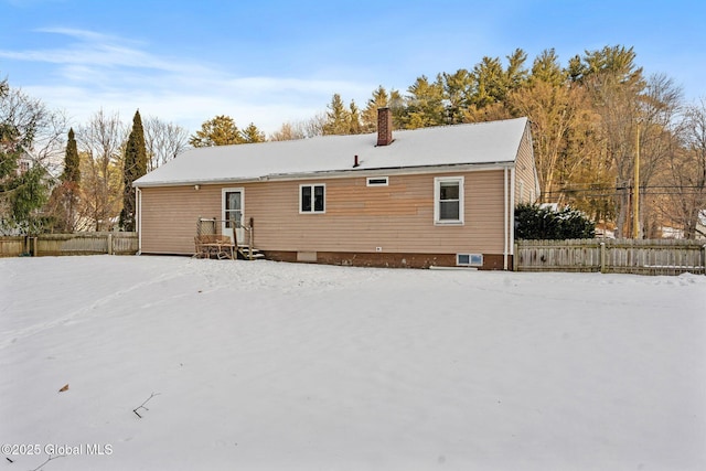 view of snow covered property