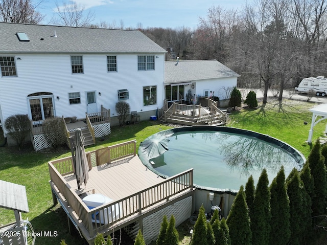 987 Grooms Rd, Rexford, NY 12148 - view of pool with a yard, a wooden deck, and a covered pool
